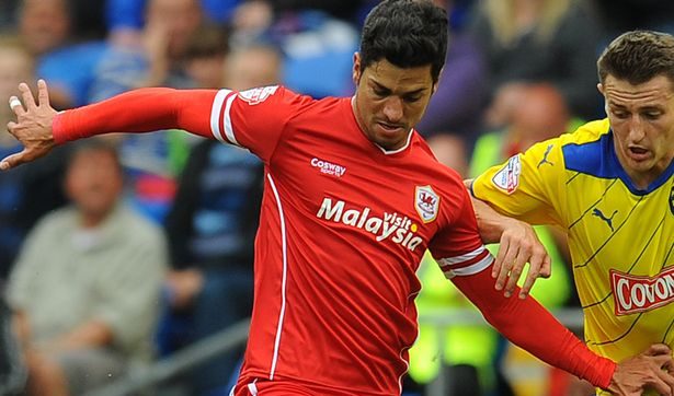 Javi Guerra fighting for a ball at a Premier League match with Cardiff City